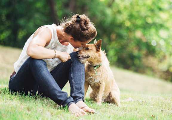 Woman Kissing a Dog at Ellicott Grove, Ellicott City, Maryland