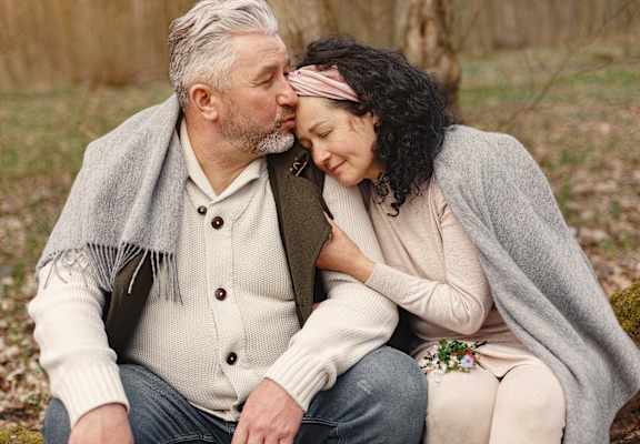 Older Couple Relaxing in the Woods
