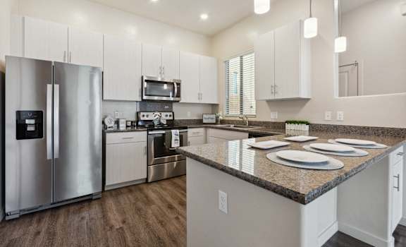 a kitchen with stainless steel appliances and granite counter tops at Pima Canyon, Arizona, 85704