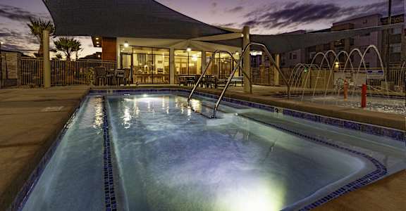 the pool at night at the resort at governors crossing