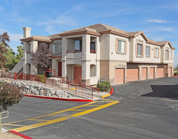 a house with a parking lot in front of it at Carlisle at Summerlin Apartments ,Las Vegas, Nevada, 89144