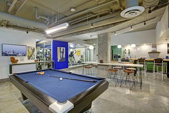 play a game of pool on the pool table in our common room
