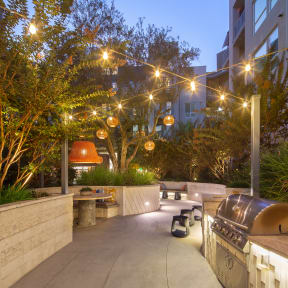 Outdoor park and grill at The Q Playa - apartments in Culver City in Los Angeles, CA