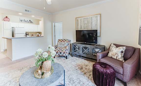 a living room with a couch and a table