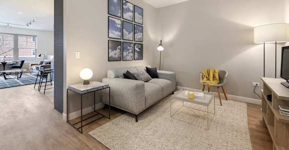 a living room with a couch and a table