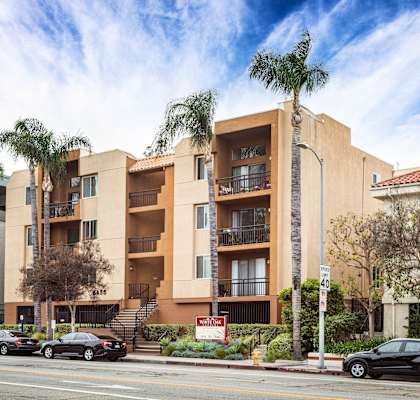 Classic Exterior View of Building with Balconies at White Oak Gardens, Encino, 91316
