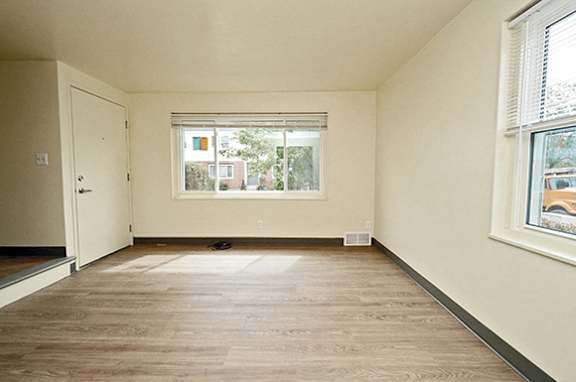 Oxford Village Townhomes – Living Room – Amherst Area – Appliances Included - 24 Hour Emergency Maintenance – Carpeting – Storage – Ask for a Tour -- Internet and Cable Ready - Affordable - Remolded –