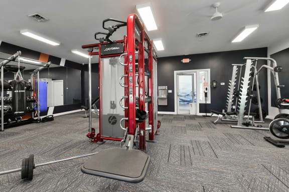 the gym at the enclave at woodbridge apartments in sugar land, tx