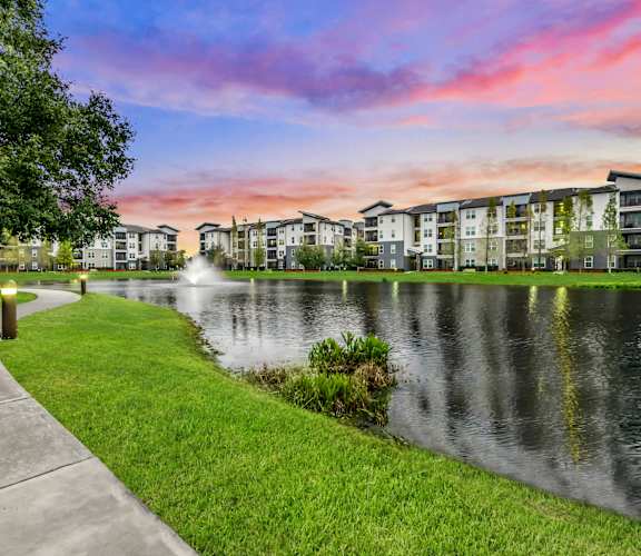 Sidewalk besides Beautiful Fountain at Pearce at Pavilion Luxury Apartments, Florida