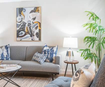 Living Room with a Gray Couch at The Oak at Island Creek Village, Duxbury, 02050