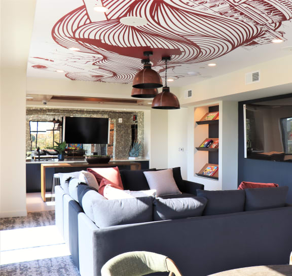 a living room filled with furniture and a flat screen tv at Vyne One Loudoun, Ashburn, 20147