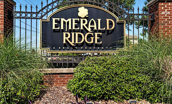 a sign for emerald ridge apartments