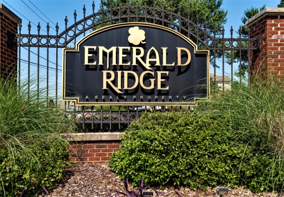 a sign for emerald ridge apartments