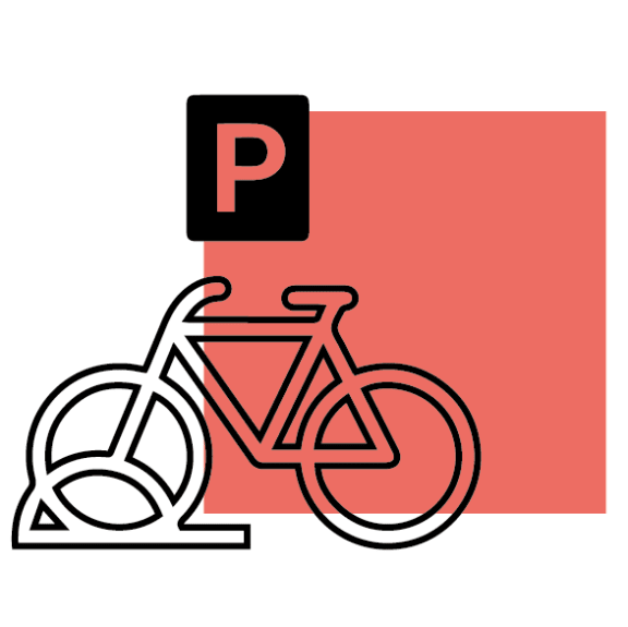 a bicycle parked next to a parking sign