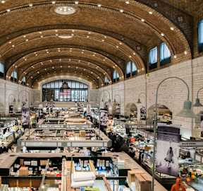 a view of a large market hall with lots of products