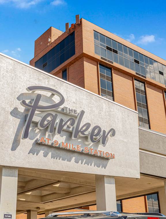 The Parker at Mike's Station building has a large sign on the front.