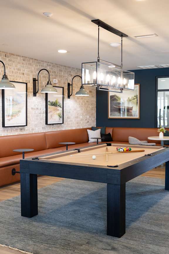 Billiard table is in the middle of a room at The Crest at Oakwood, Oakwood, GA, 30566