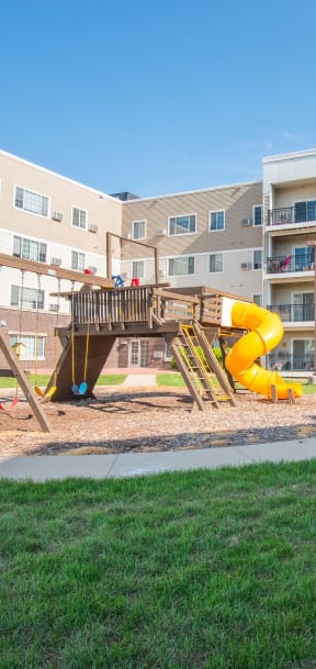 private playground at the flats at big tex apartments