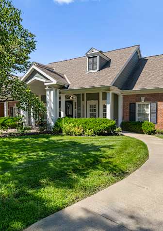 the gym is equipped with a variety of weights and cardio equipment at Somerset Oaks Apartment Homes, Olathe