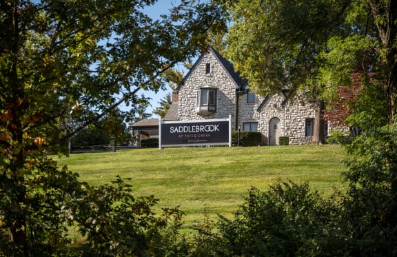 a house with a sign in front of it
