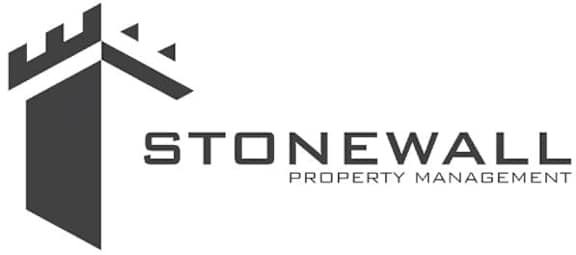 A logo for Stonewall Property Management featuring a castle tower.