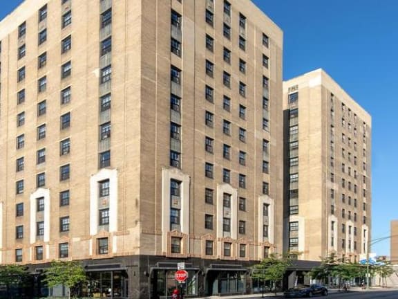 a tall building with a street in front of it