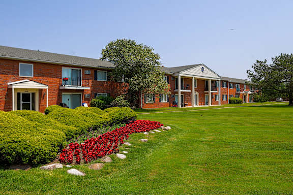 A building with a lawn in front of it.