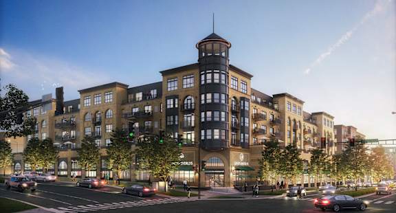 a rendering of an apartment building on a city street