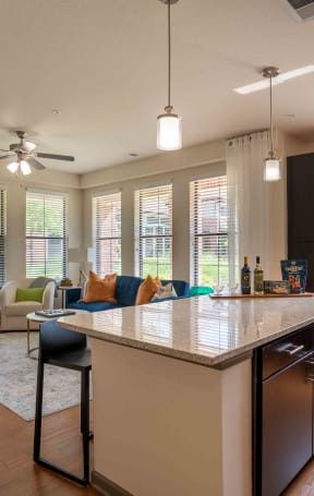 a kitchen with green walls and a white counter top