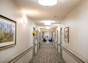 Thumbnail 8 of 29 - Long Hallway at Spring Arbor of Wilson, Wilson, NC