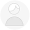 A grey silhouette of a person with a circle for a head.