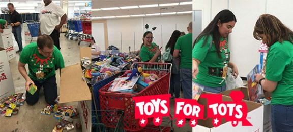 a group of people working in a grocery store with a cart full of toys