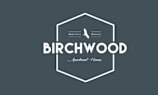 the logo homes with a bird flying
