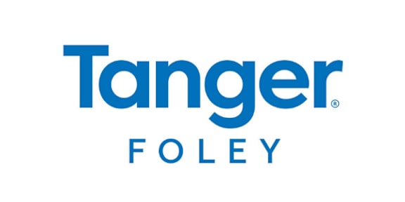 A blue and white logo that says Tanger Foley.