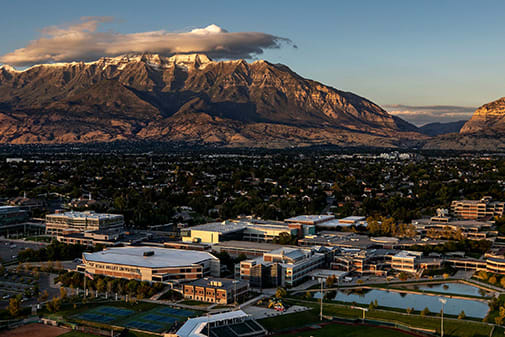 A mountain with snow on top and a city in the foreground. at The Alloy at Geneva, Vineyard, UT