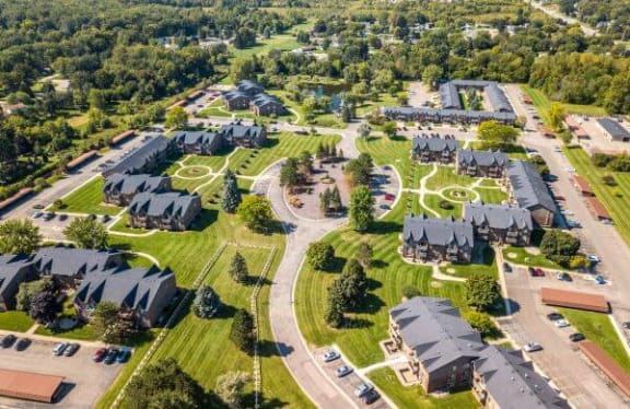 an aerial view of a neighborhood with houses and lawn