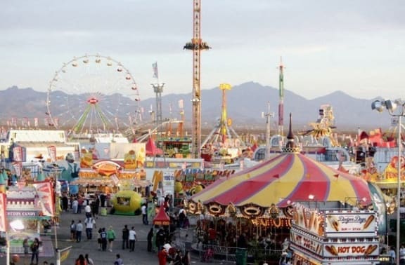 a view of a carnival at the county fair