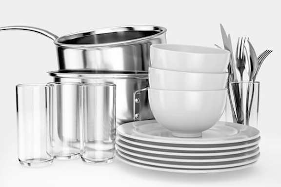 A collection of white and clear glassware is displayed.