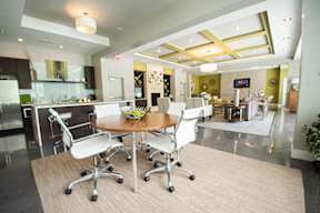 Clubroom With Smart Tv And Fireplace at Link Apartments® Manchester, Richmond, VA