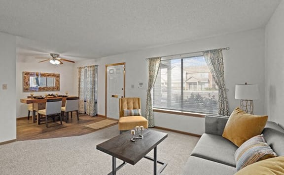 a living room with a couch and a table