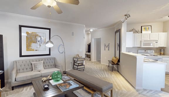 a living room with a couch and a table