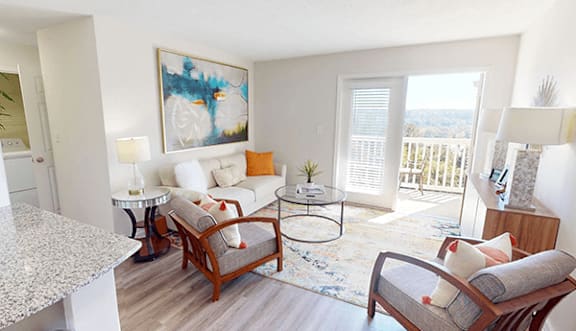 a living room with a couch and a table