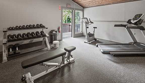 fitness center at apartment complex