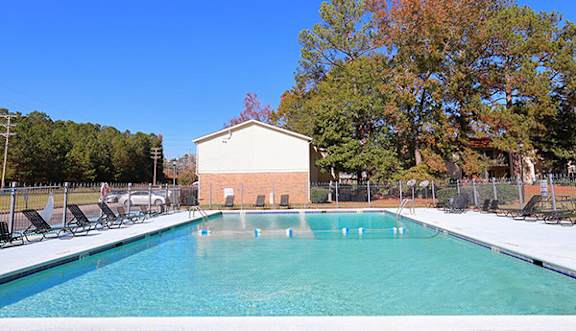A pool with a depth marker reading 3 feet.