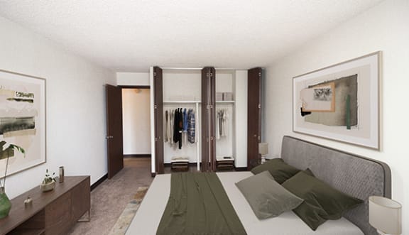 a bedroom with a bed and a mirror