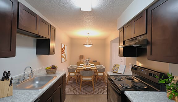 view of kitchen and dining room at the preserve at polk apartments