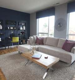 a living room with a couch and a coffee table