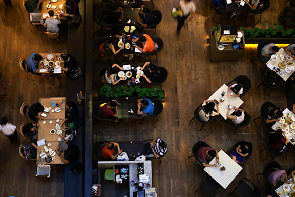 A top view of a restaurant with people eating.