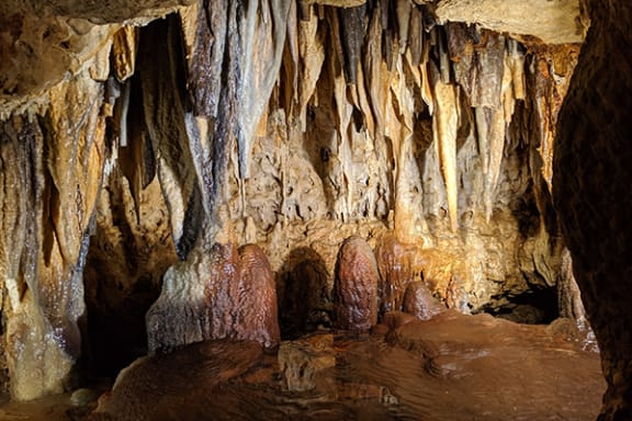 a cave with stalactites and stalagmites