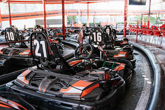 A go-kart race track with numbered go-karts.